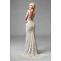 Fit-and-Flare V-Neckline Wedding Dress with Plays Backdrop to Dramatic Wildfell Floral Motifs